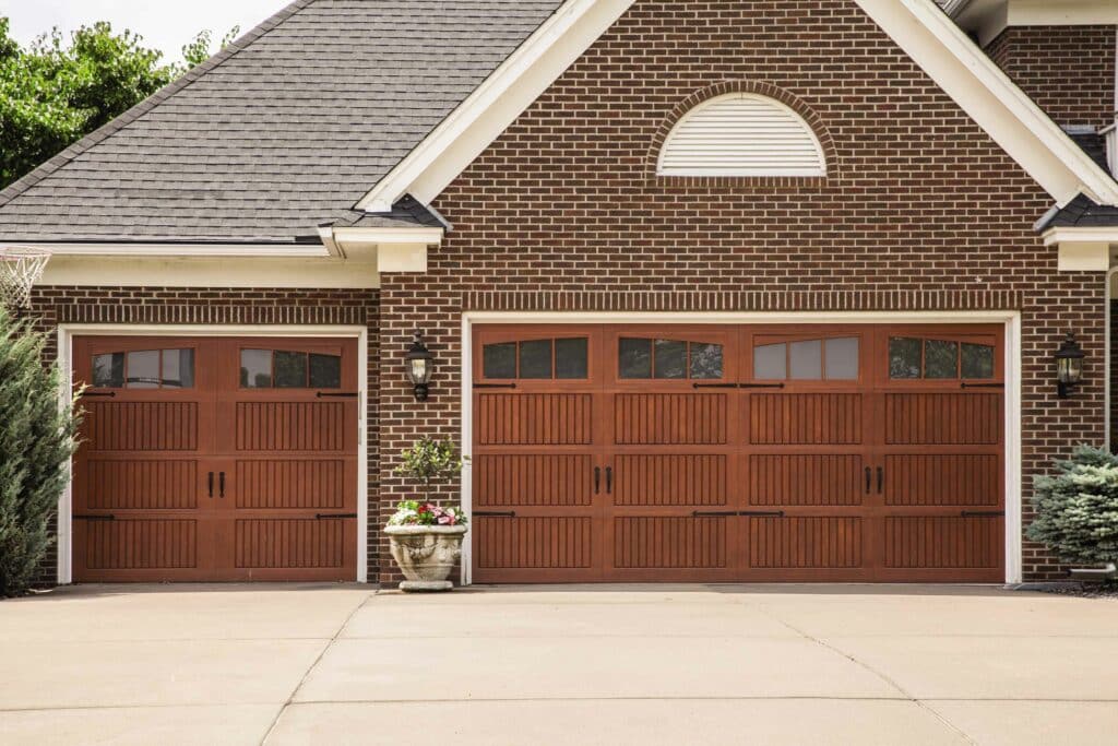 Two impression fiberglass garage doors